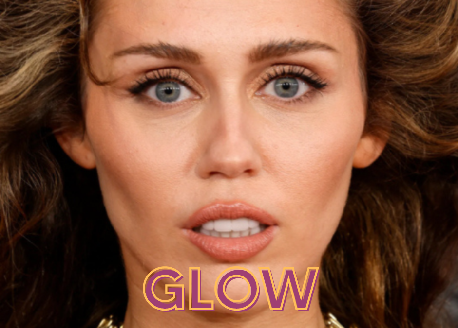 Miley Cyrus shows off her glow at the Grammys.